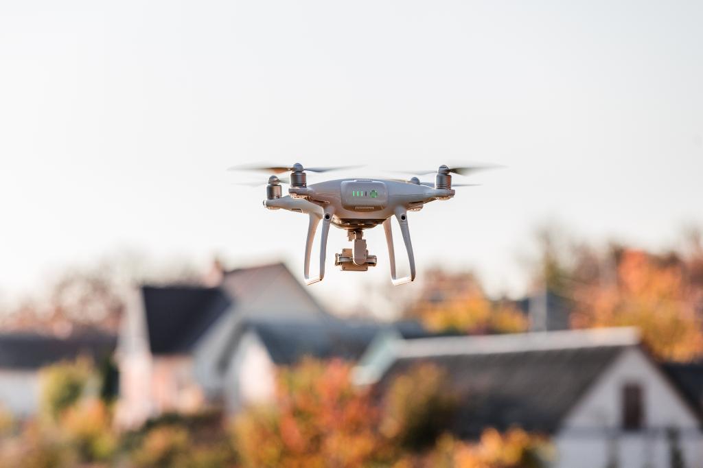 drone flying front of home.