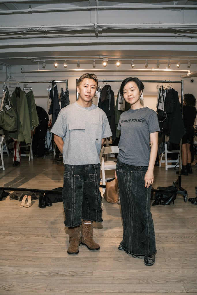 Designers Haoran Li and Siying Qu at a Private Policy fashion show in New York with Anna Delvey, September 11, 2024