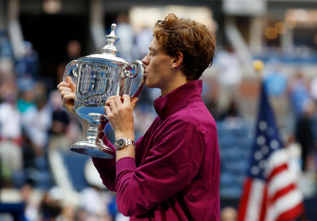 Jannik Sinner of Italy holds up the US Open Trophy after defeating Taylor Fritz of the US during their match on Arthur Ashe Stadium  on Sept. 8, 2024.