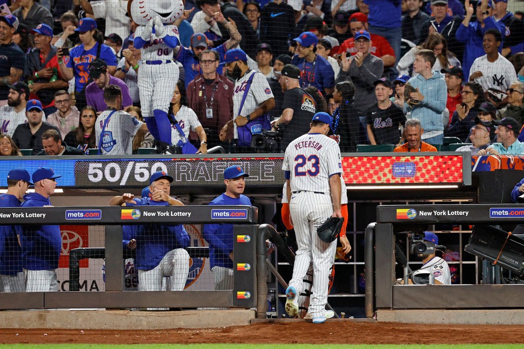 David Peterson walks off the field following a start for the Mets during the 2024 season.