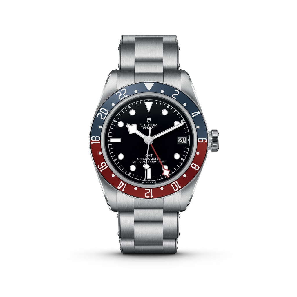 A silver Tudor Black Bay GMT 41mm steel watch with red and blue dial