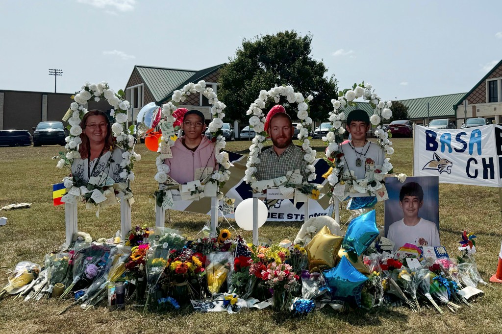 The four victims of the Apalachee shooting honored with posters outside the school.