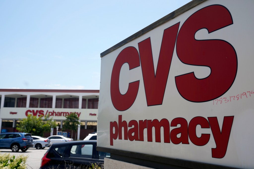 A sign marking a CVS branch in Pasadena, California in the background