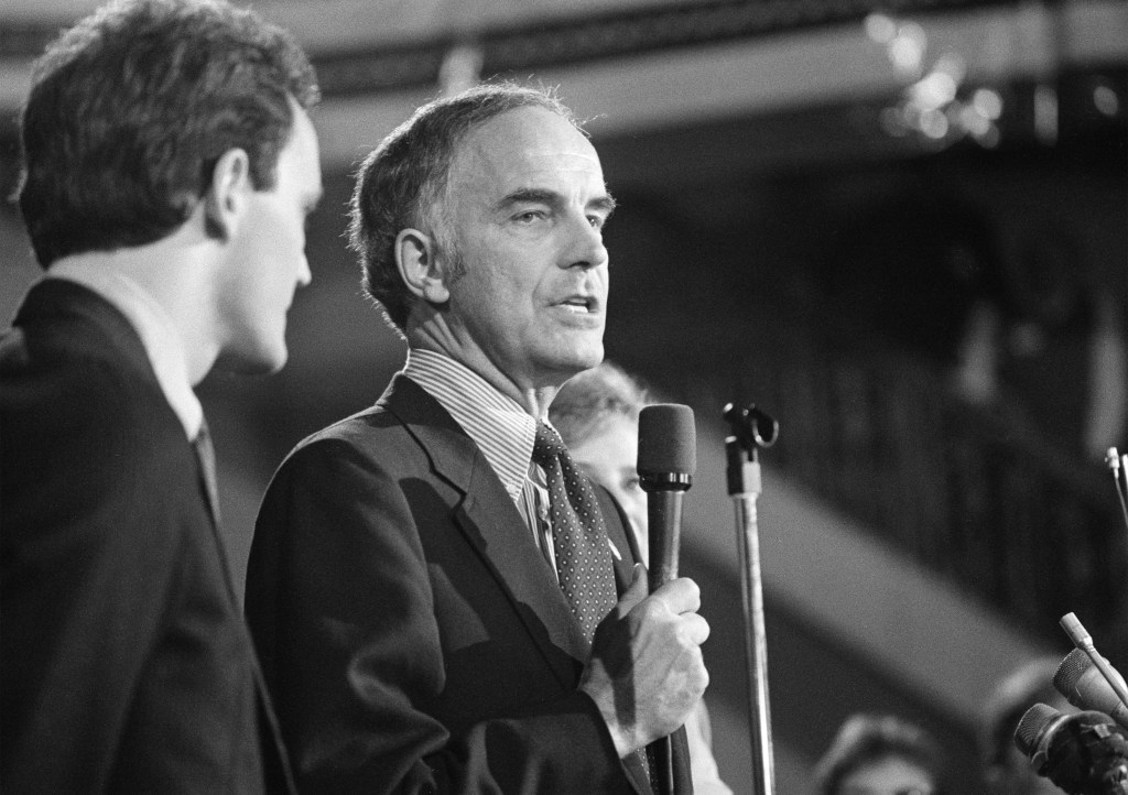 Sen. Dan Evans (R-Wash.) stands with his son Dan Jr., after he won the primary election for the senate seat for Washington State, Oct. 12, 1983.