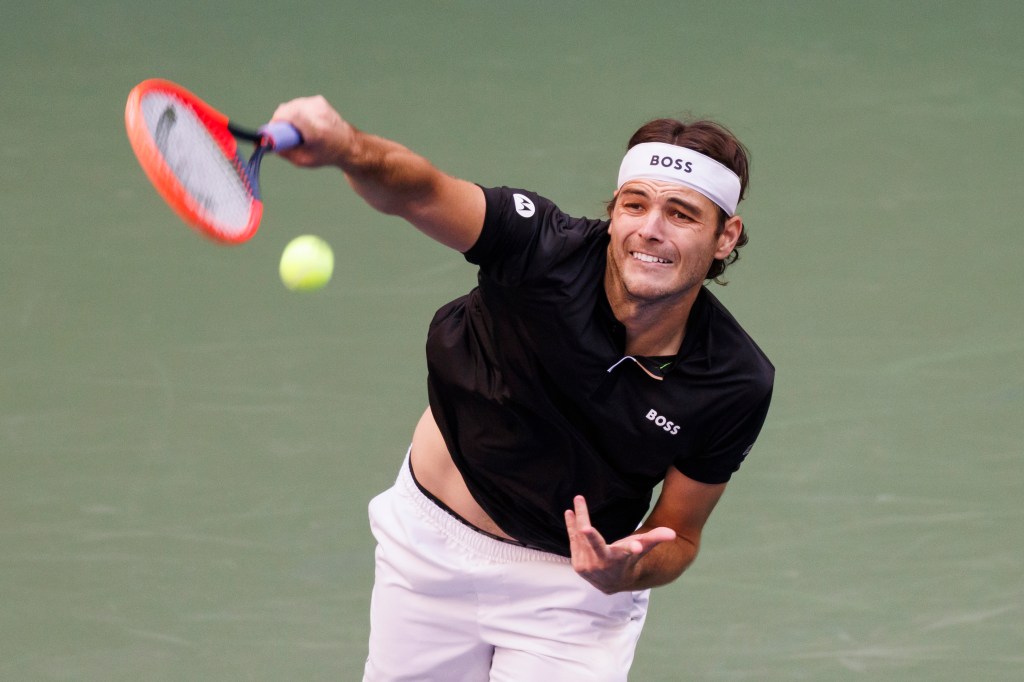 Taylor Fritz serves against Jannik Sinner during their Menâs Championship match at the 2024 US Open Championships played in the USTA Billie Jean King Tennis Center on September 8, 2024.