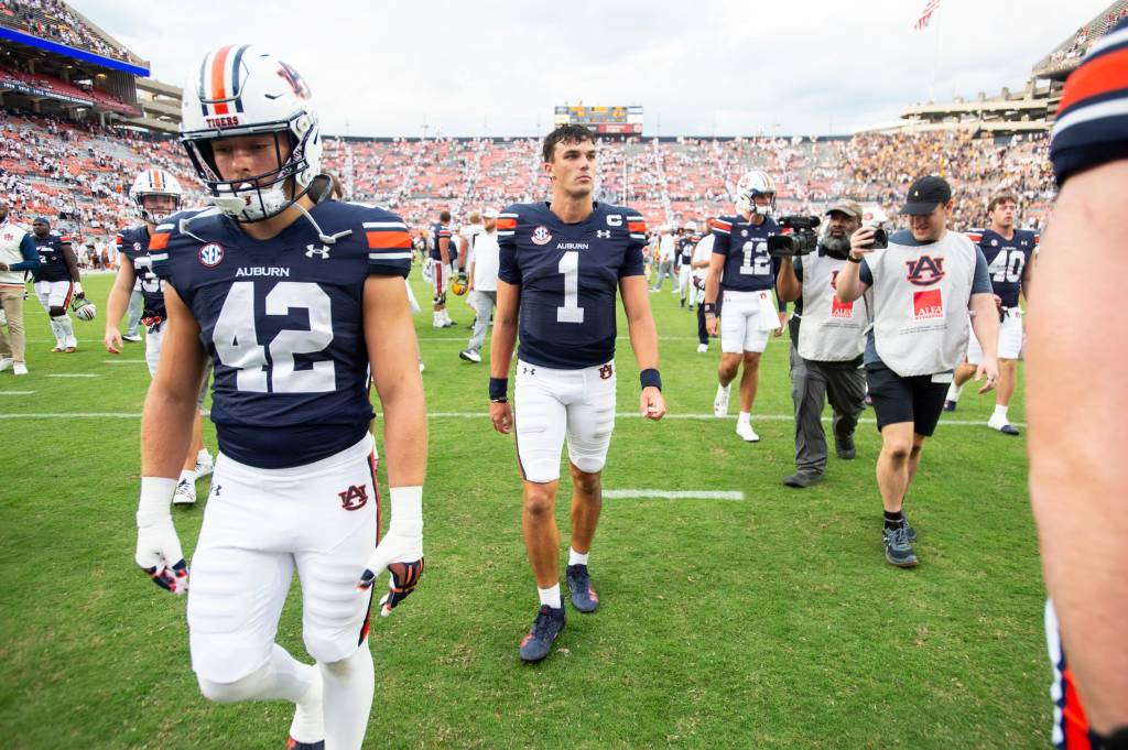 Auburn quarterback Payton Thorne (1) walks off the field.