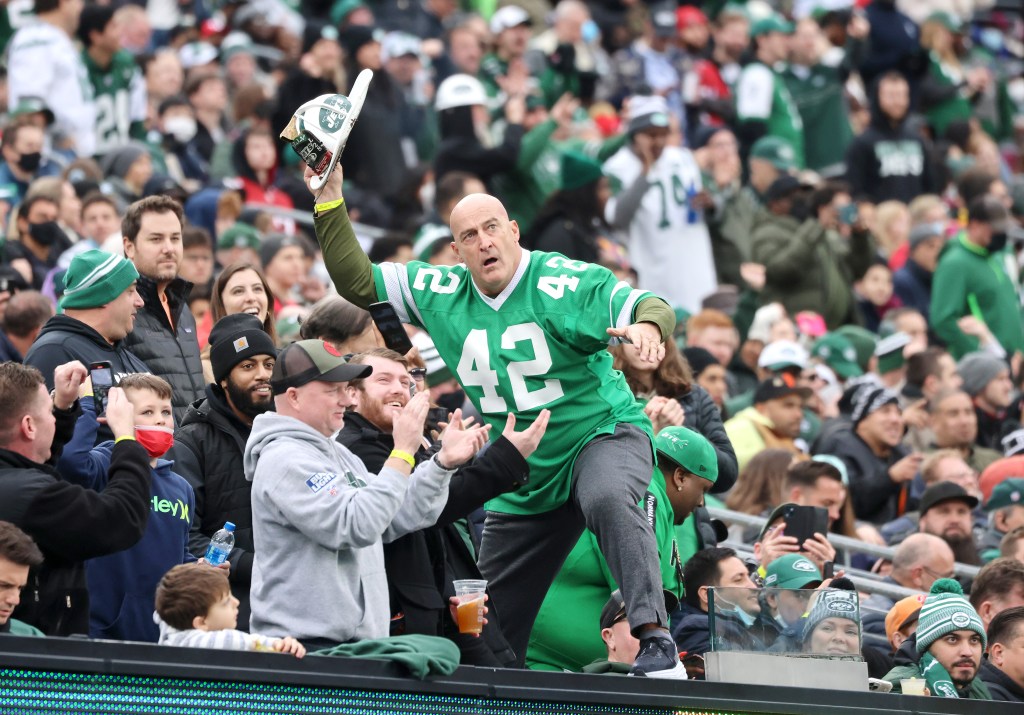 Fireman Ed whips up the crowd at MetLife Stadium.