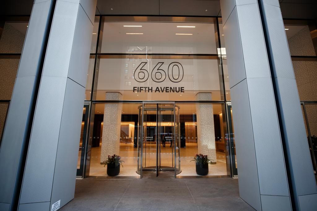 Glass entrance to the building at 660 5th Avenue.