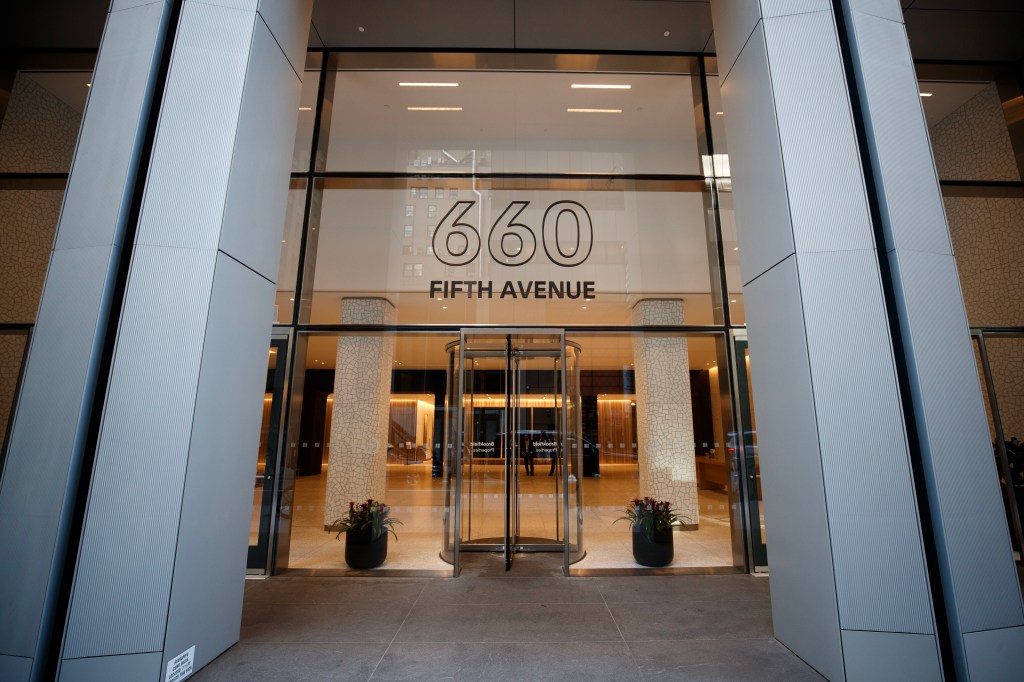 Glass entrance to the building at 660 5th Avenue.