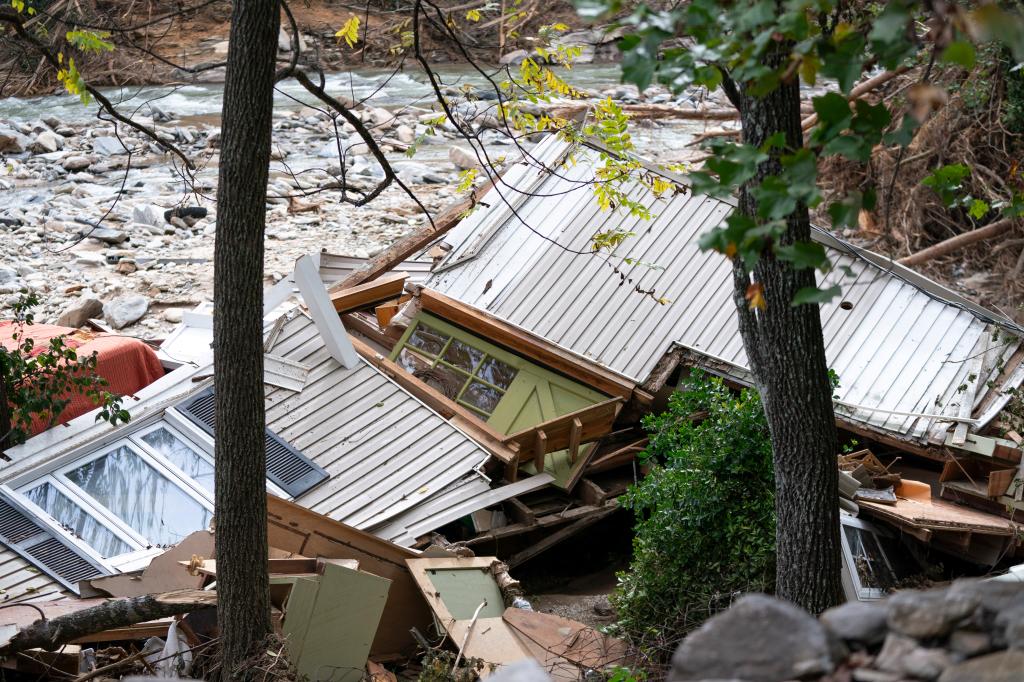 A destroyed house lies next to the Broad River after Hurricane Helene on Oct. 1, 2024 in Bat Cave, North Carolina.