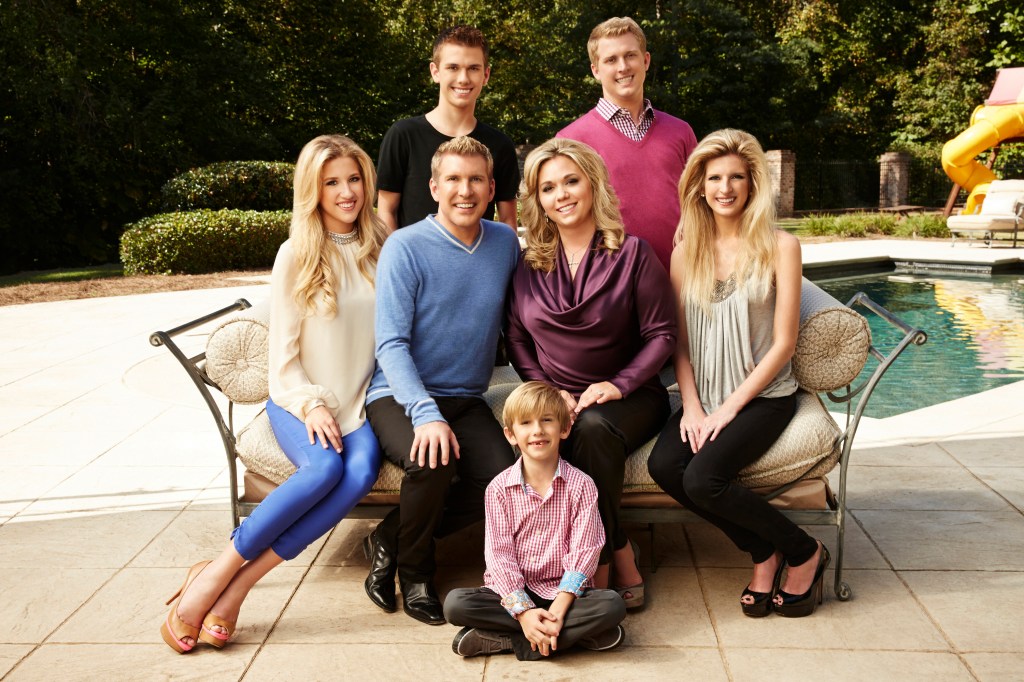  back row from left,  Chase Chrisley and Kyle Chrisley, second row from left,  Savannah Chrisley, Todd Chrisley, Julie Chrisley, and Lindsie Chrisley Campbell, and front center Grayson Chrisley