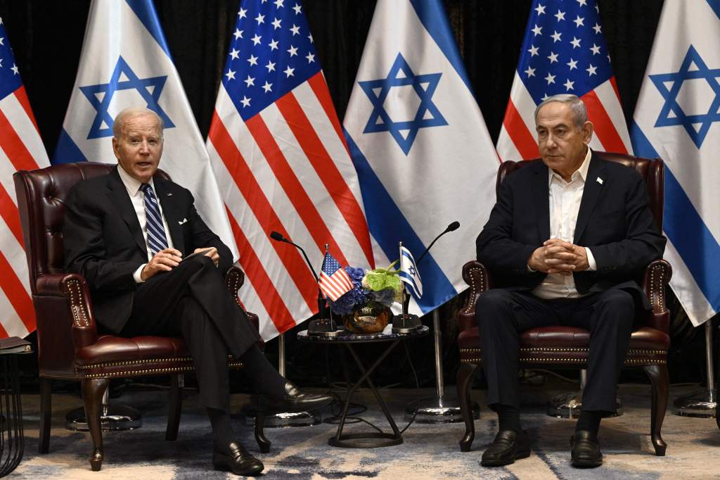 Joe Biden and Benjamin Netanyahu as he joins a meeting of the Israeli war cabinet  in Tel Aviv on October 18, 2023, 