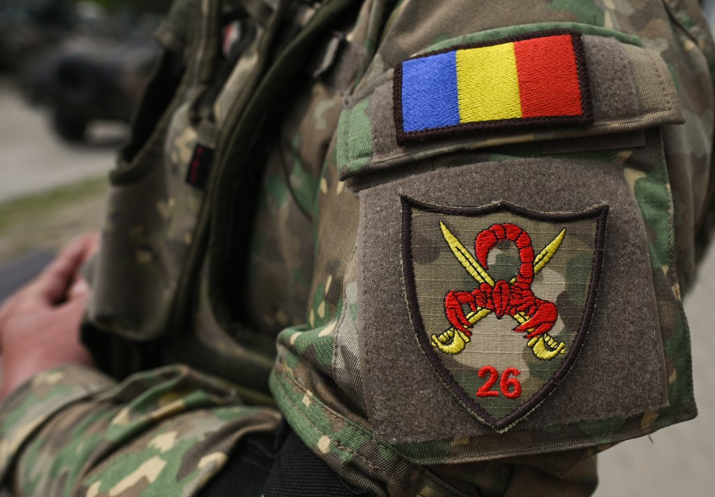 The 26th Infantry Battalion 'Red Scorpions' badge is seen on the Romanian solder uniform are seen during a high-intensity training session at the Nowa Deba training ground on May 06, 2023 in Nowa Deba, Poland.