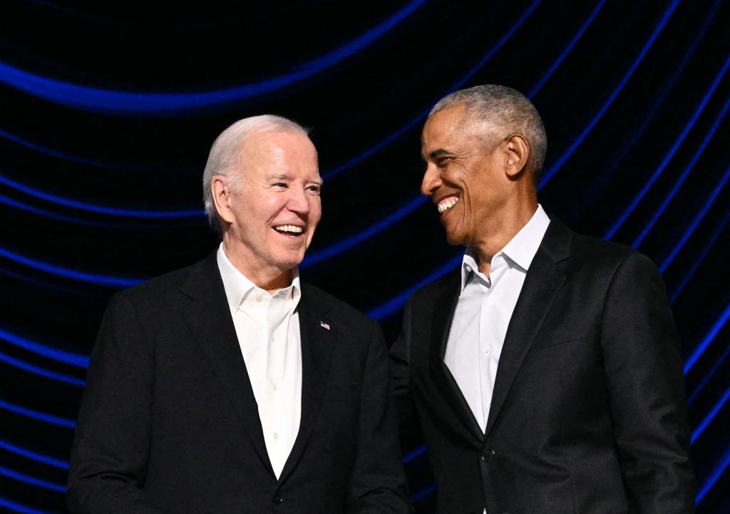 Joe BIden shares a joke with Barack Obama