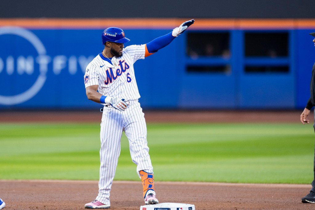 Starling Marte reacts after he hits a double during the first inning of game five of the NLCS at Citi Field, Friday, Oct. 18, 2024, in Queens, New York.