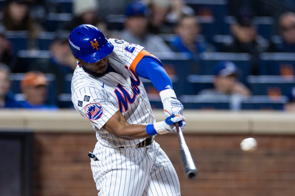 Starling Marte hits a RBI single during the 8th inning of game five of the NLCS at Citi Field, Friday, Oct. 18, 2024, in Queens, New York. 