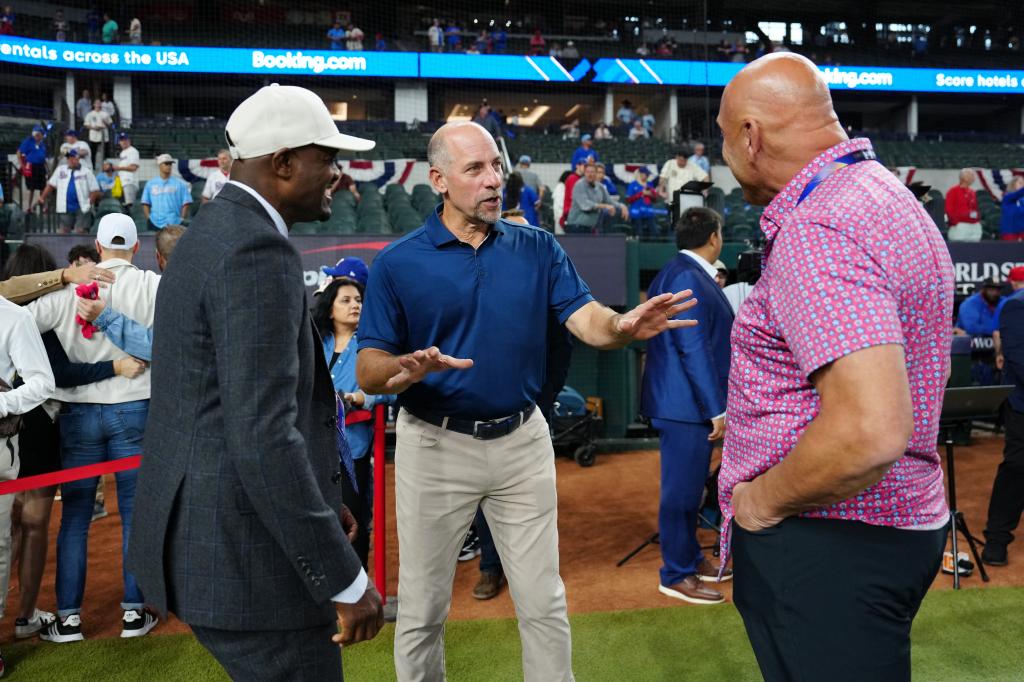 Harold Reynolds, John Smoltz, and Dave Valle discussing prior to Game 2 of the 2023 World Series between the Arizona Diamondbacks and the Texas Rangers at Globe Life Field, Arlington, Texas