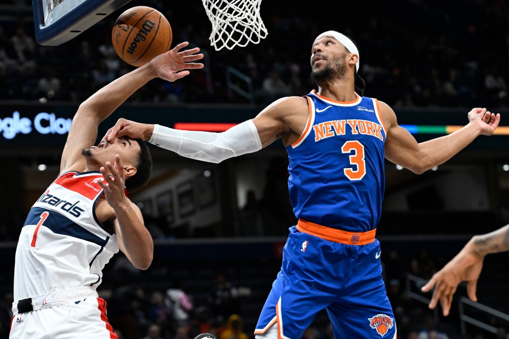 Josh Hart hits Johnny Davis in the face after blocking his shot in the Knicks' 118-117 preseason loss to the Wizards on Oct. 18, 2024.