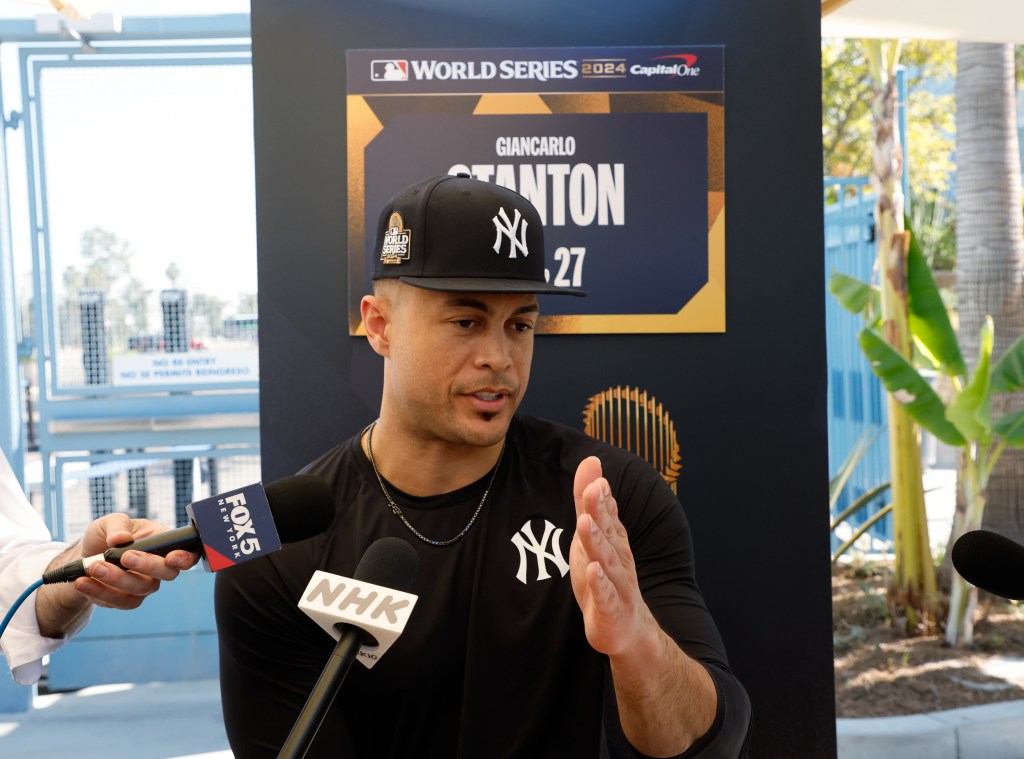 New York Yankees designated hitter Giancarlo Stanton talks to the media on Media Day on the eve of the 2024 MLB World Series against the Los Angeles Dodgers, Thursday, Oct. 24, 2024