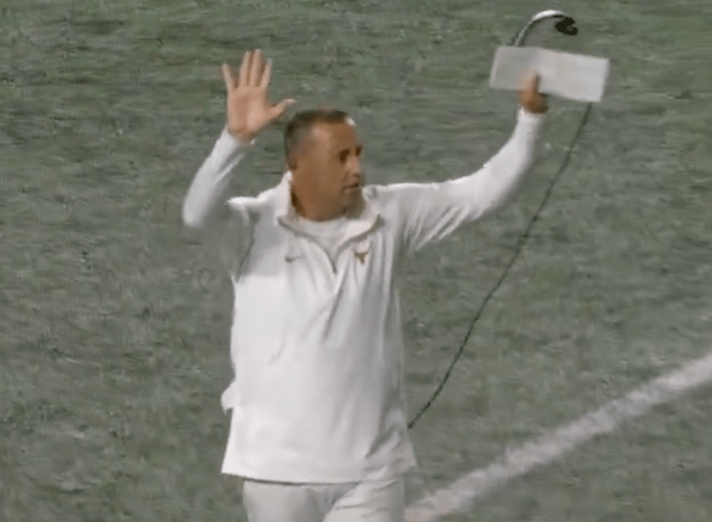 Steve Sarkisian had to help stop the home fans from getting out of hand.