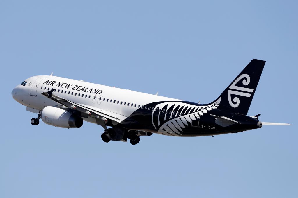 An Air New Zealand passenger plane takes off.