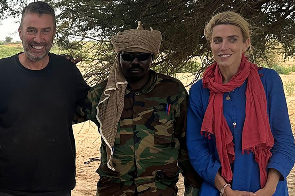 CNN's Clarissa Ward  with her cameraman Scott McWhinnie and one of their captors after they were told they would be released.