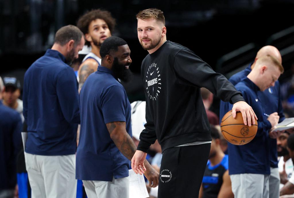 Mavericks guard Luka Doncic dribbles during a timeout