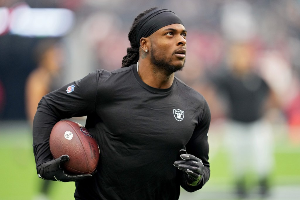 Davante Adams #17 of the Las Vegas Raiders warms up before a game