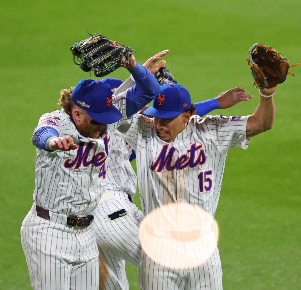 Mets celebrate their Game 5 win over the Dodgers in the NLCS on Oct. 18, 2024.