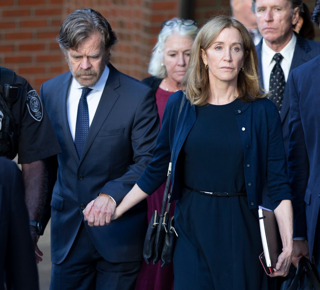 Felicity Huffman and husband William Macy exit the Moakley Courthouse after her sentencing on Sept. 13, 2019.