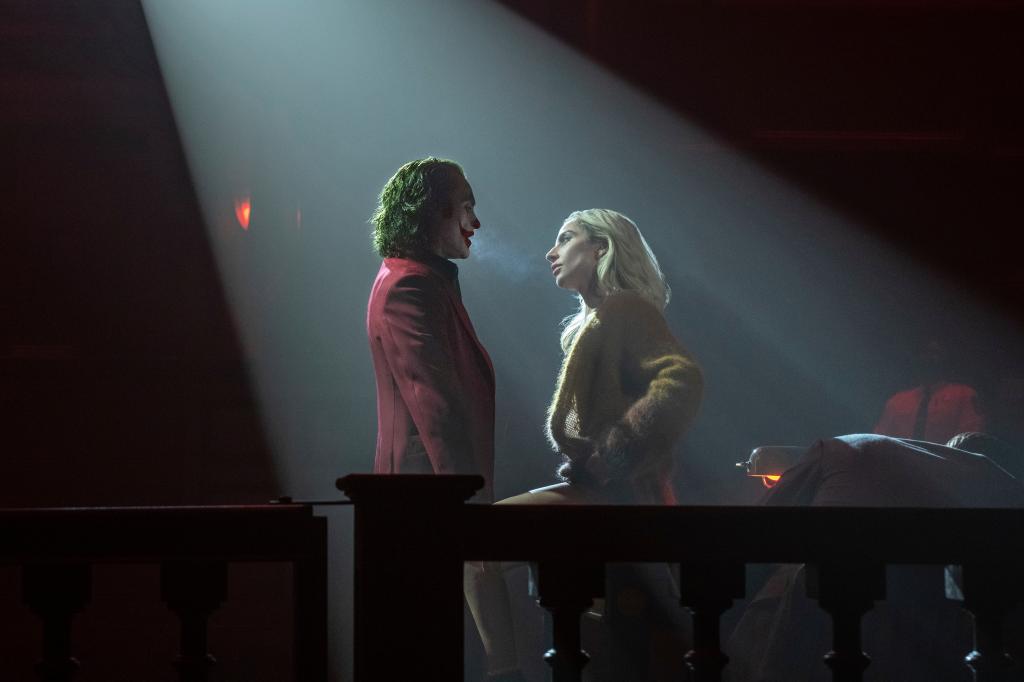 Joaquin Phoenix and Lady Gaga in a spotlight