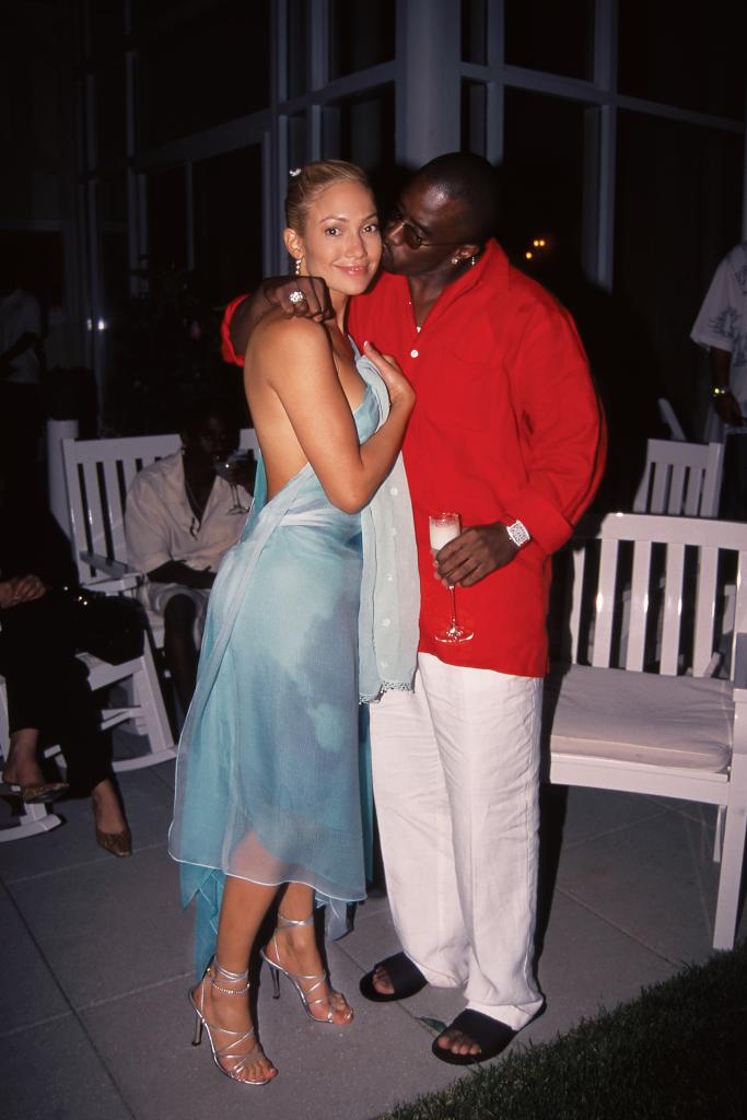 Jennifer Lopez and Sean Combs posing at Sean Combs' Fourth of July Party in East Hampton, NY on July 2, 2000