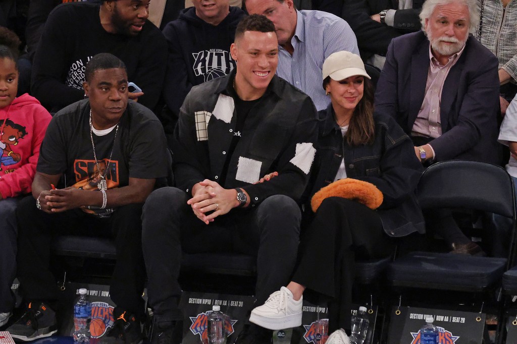 Aaron Judge and his wife Samantha Bracksieck sit on celebrity row during the second half when the New York Knicks played the Miami Heat Saturday, January 27, 2024 at Madison Square Garden in Manhattan, NY.  