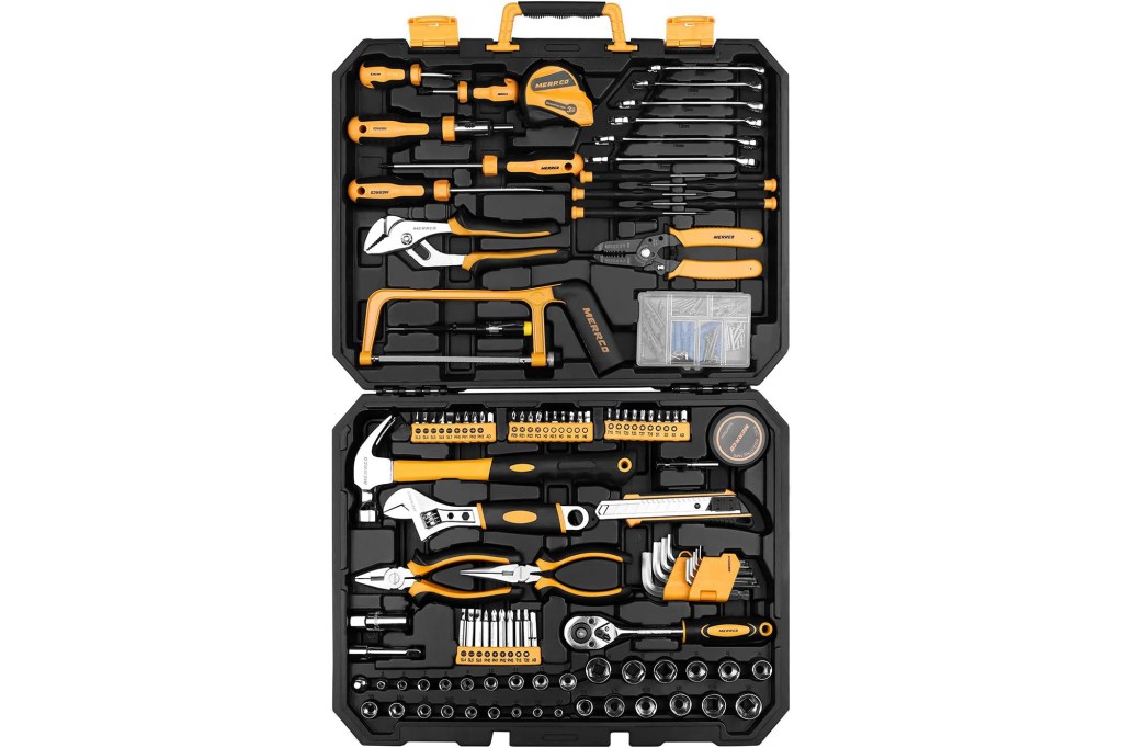 A black and yellow toolbox filled with various tools