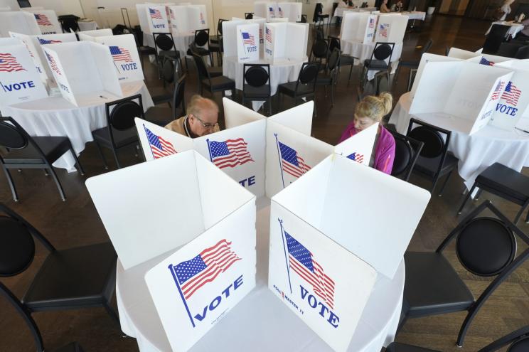 Voters filling out their ballots during the Michigan primary election on Feb. 27, 2024, in Grosse Pointe Farms, Michigan.