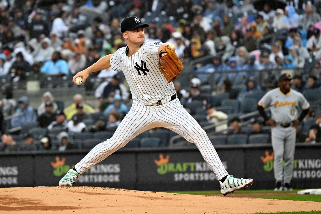 Yankees pitcher Clarke Schmidt (36) delivers the ball