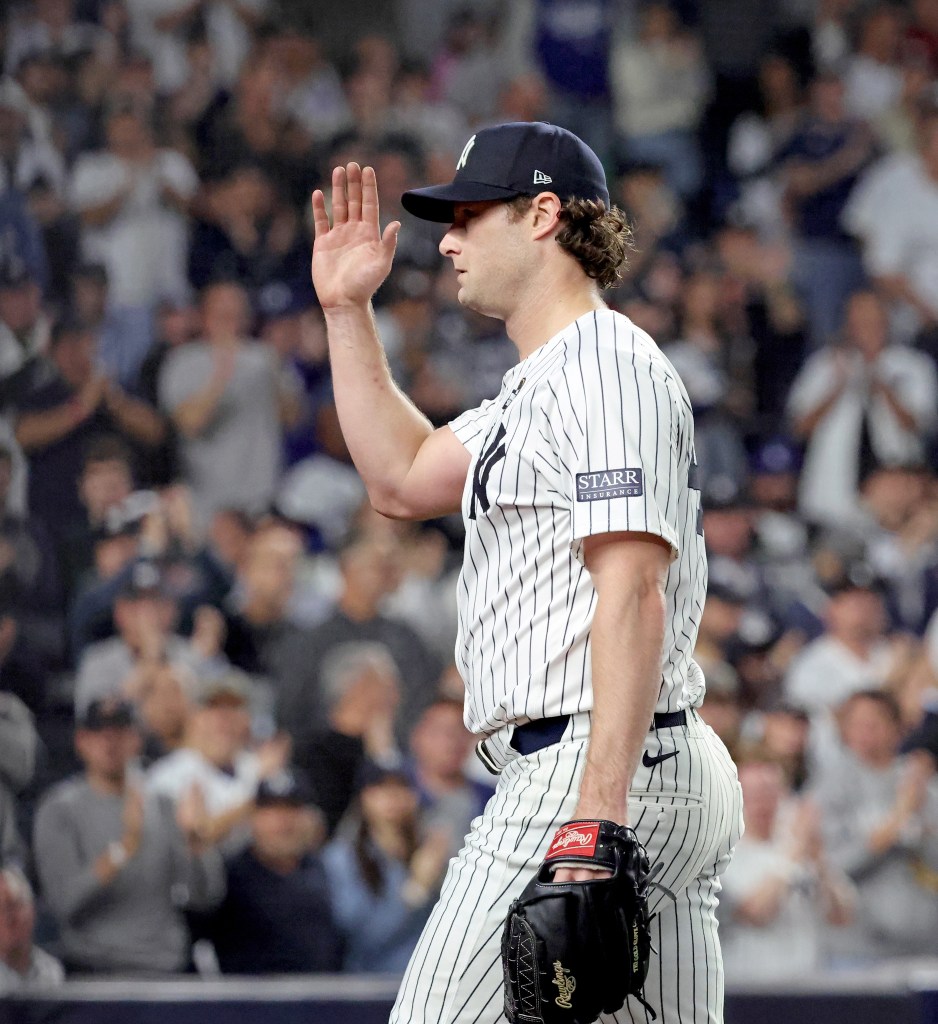 New York Yankees starting pitcher Gerrit Cole #45 saluting fans as he leaves the field during the 7th inning of World Series Game 5 at Dodger Stadium