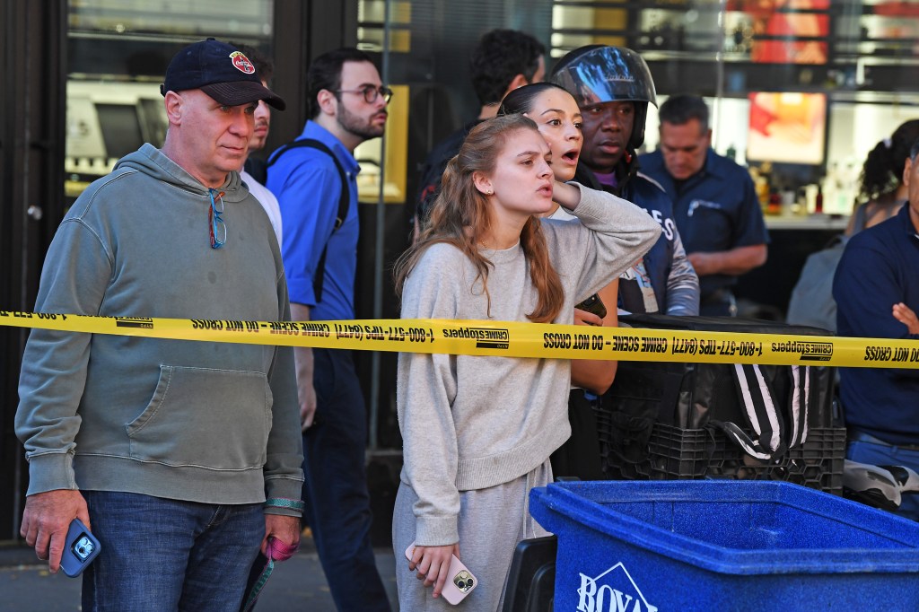 110724 The NYPD respond to a shooting at Columbus Ave and W 69th, then track the suspect into the subway station at 72 st and Central Park West.