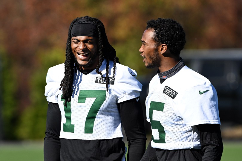 Jets wide receivers Garrett Wilson (5) and Davante Adams (17) talk at practice in Florham Park, NJ. 