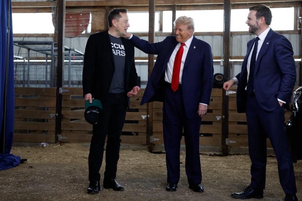 Elon Musk, President-elect Donald Trump and Vice President-elect JD Vance backstage at Butler Farm Show before Butler, Pa. rally on Oct. 5.