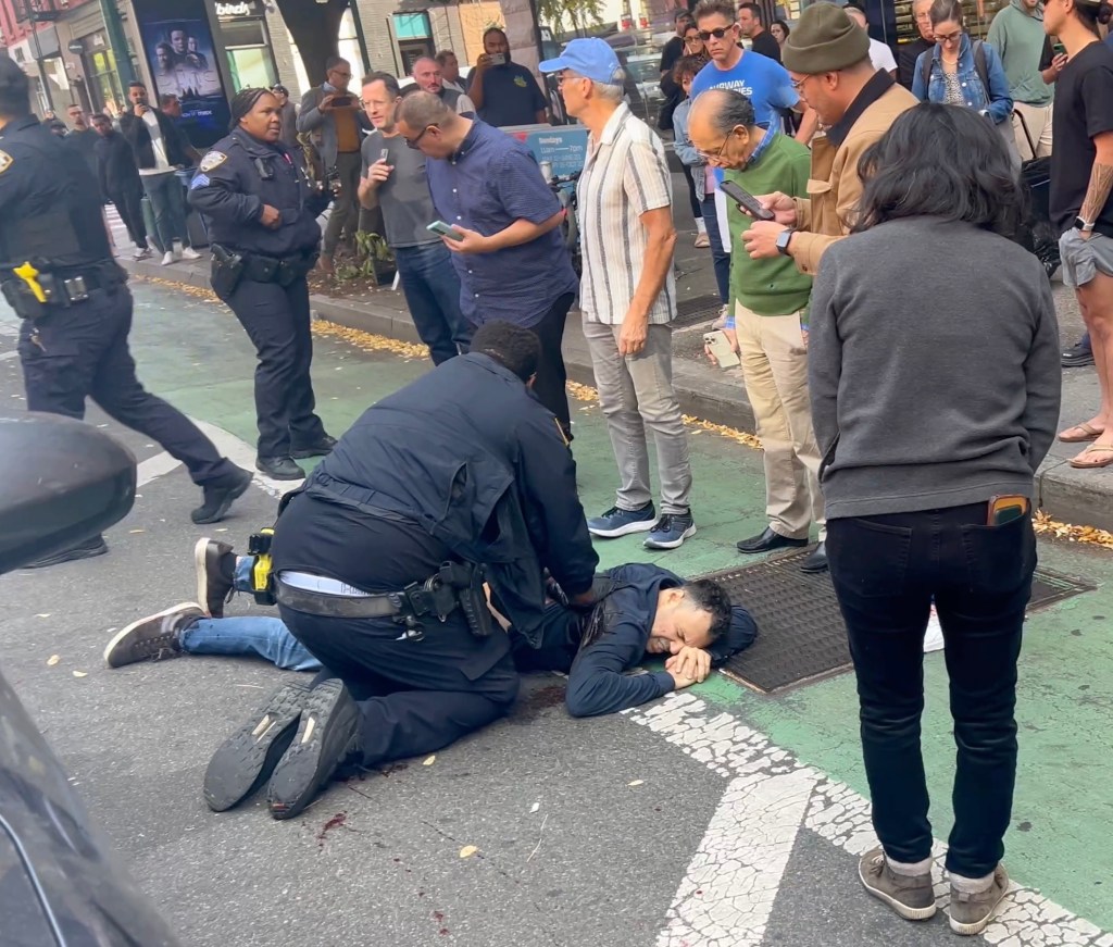 Video obtained by The Post shows Boris Shapiro lying in the street after he was shot Thursday, Nov. 7, 2024. A fired worker at a computer repair store shot his former boss in a broad-daylight at West 69th Street and Columbus Avenue.