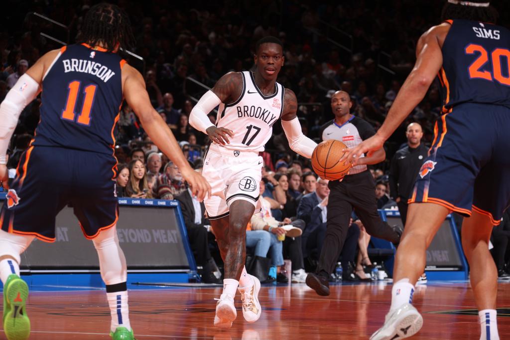 Dennis Schroder of the Brooklyn Nets dribbling the ball during a game against the New York Knicks at Madison Square Garden