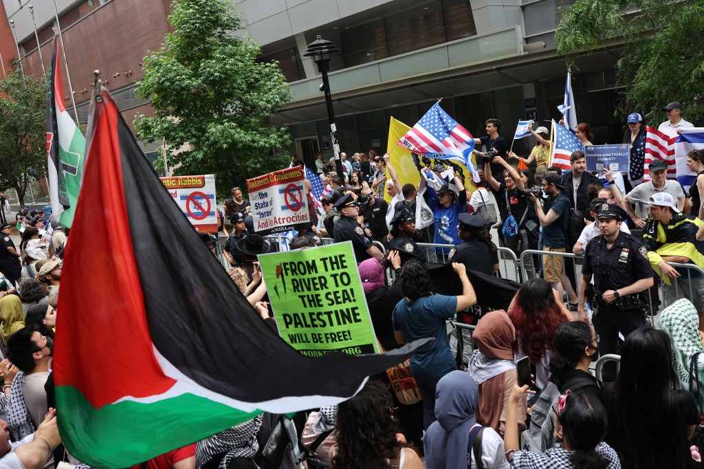 Pro-Israel protestors and Pro-Palestine protestors gather during a rally against the Baruch College Hillel campus organization at Baruch College on June 05, 2024 in New York City.