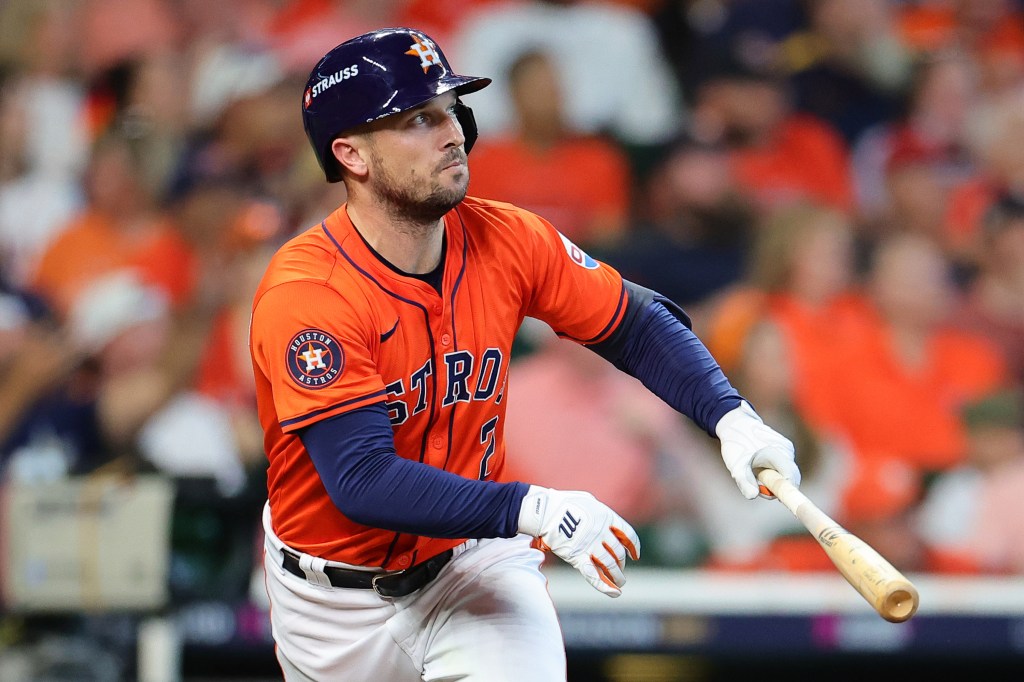 Alex Bregman #2 of the Houston Astros flies out against the Detroit Tigers in the fourth inning during Game Two of the Wild Card Series at Minute Maid Park on October 02, 2024 in Houston, Texas.