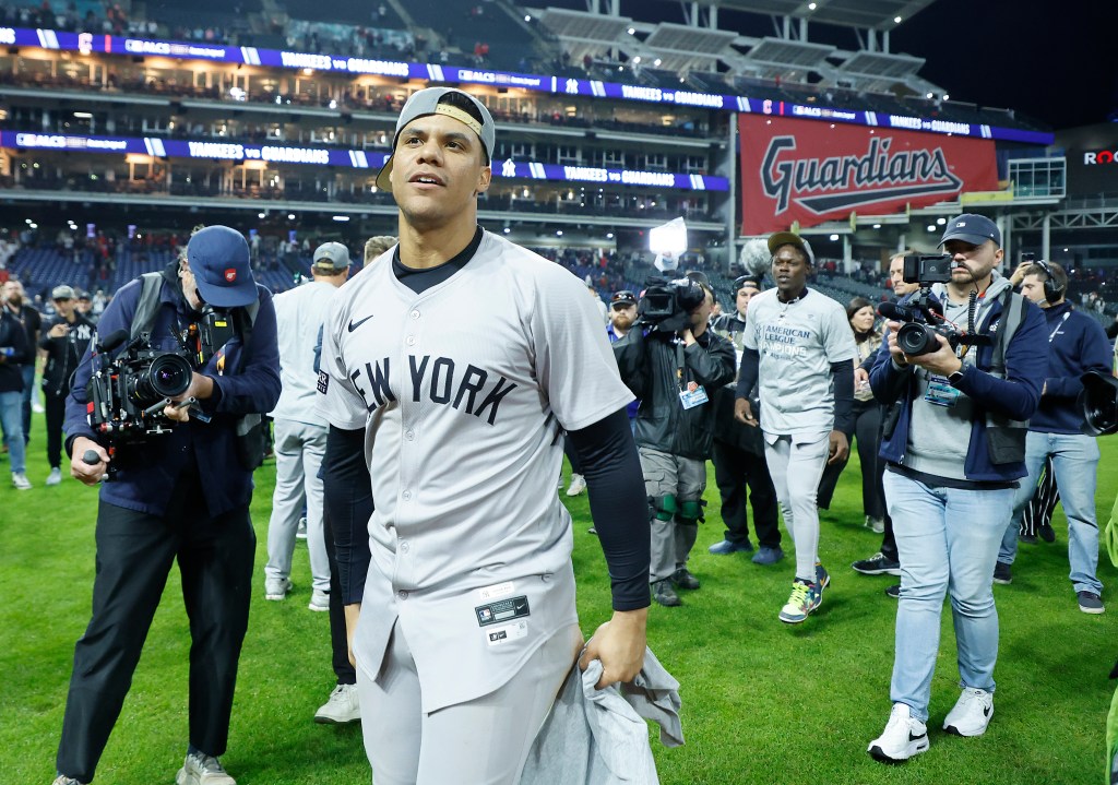 Juan Soto of the New York Yankees celebrating after the final out of the 10th inning at the ALCS game 5