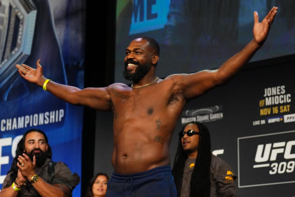 Jon Jones poses on stage during the UFC 309 ceremonial weigh-in at The Theater at Madison Square Garden on November 15, 2024 in New York City.