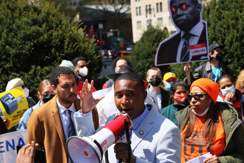 Council Member Chi Ossé speaks as people gather for a rally protesting rent hikes at City Hall Park.