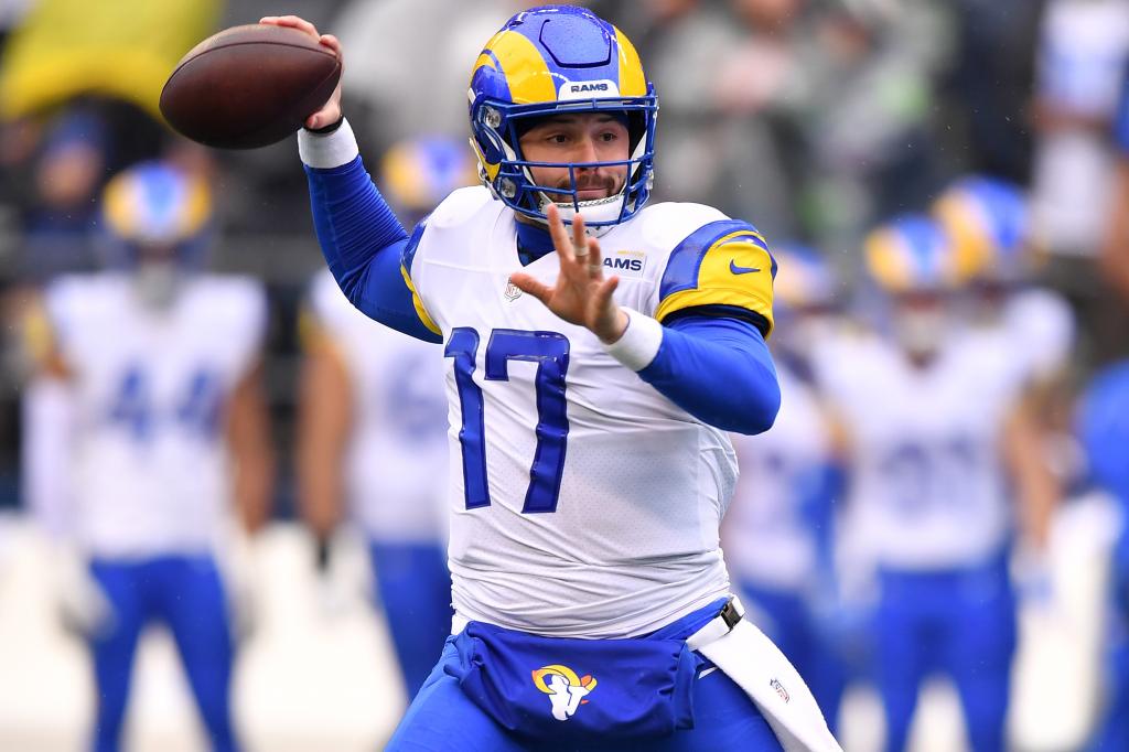 Baker Mayfield #17 of the Los Angeles Rams looks to throw the ball during the first quarter against the Seattle Seahawks at Lumen Field on January 08, 2023 in Seattle, Washington. 