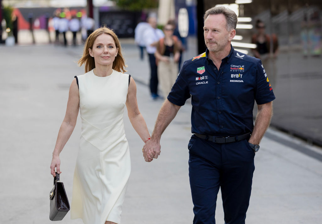 Christian Horner of Great Britain and Oracle Red Bull Racing holds hands with Geri Halliwell during the F1 Grand Prix of Bahrain at Bahrain International Circuit on March 2, 2024 in Bahrain, Bahrain.