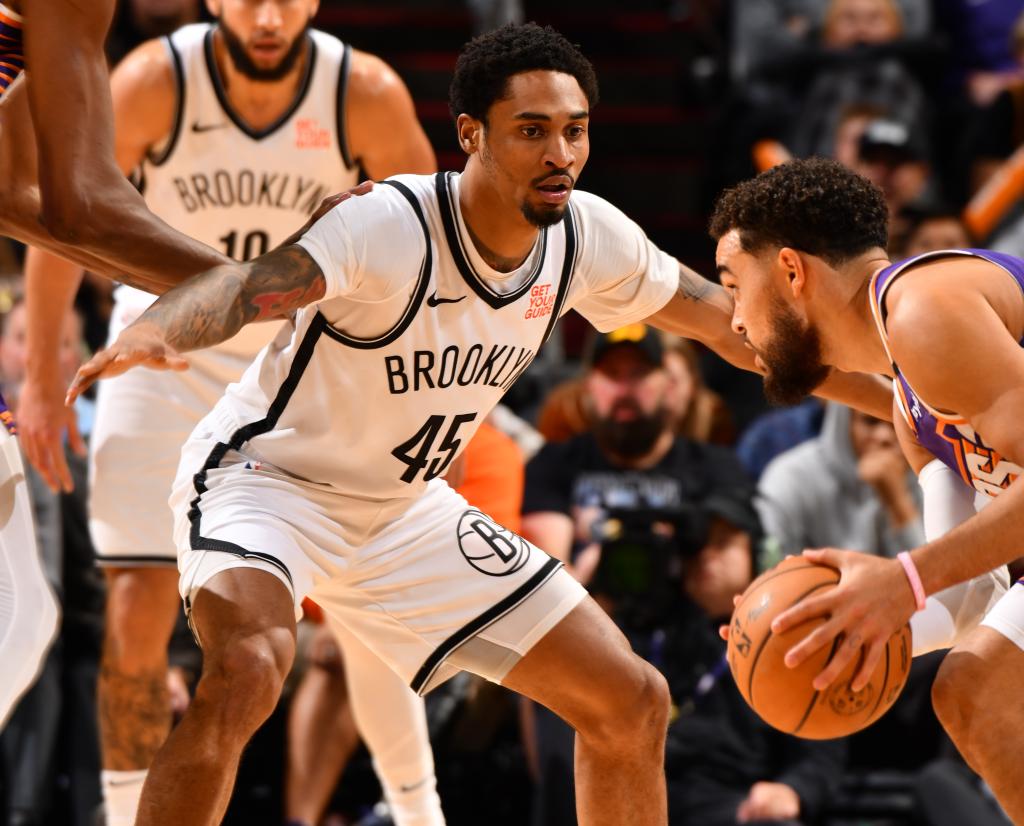 Keon Johnson, who scored a team-high 30 points off the bench, defends during the Nets' win.